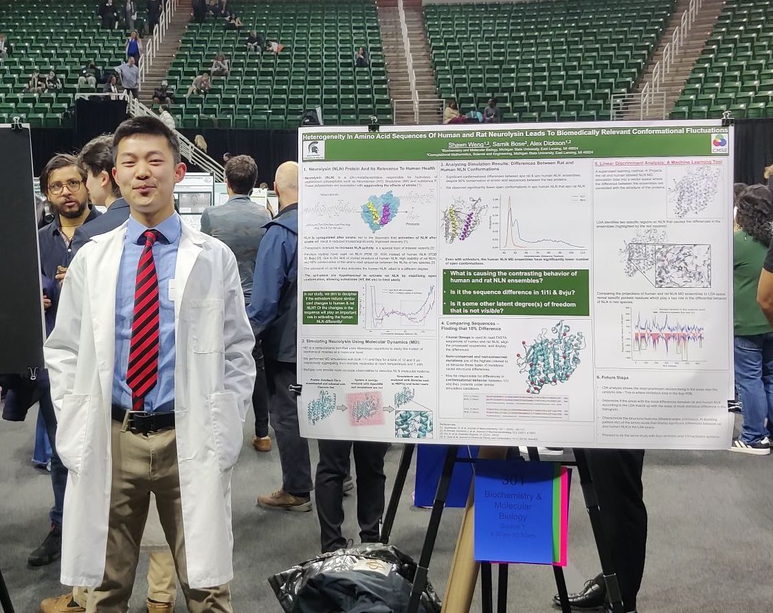 Student presenting a research poster